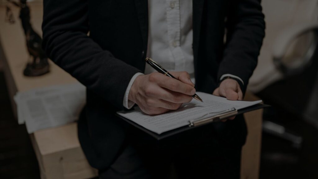 a photo of an attorney reviewing a document
