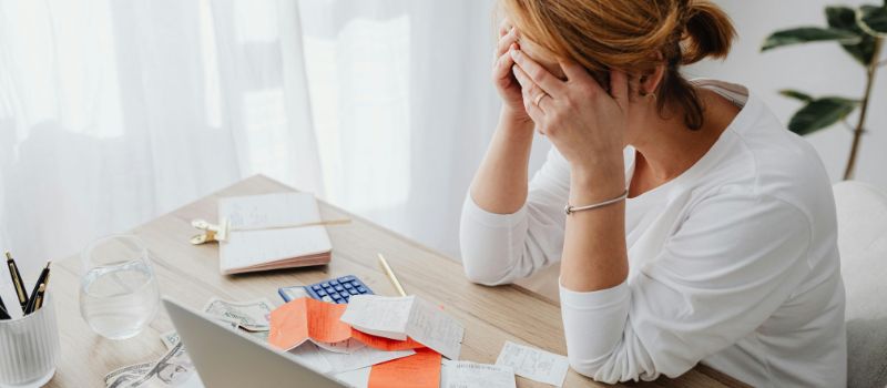 stressed owner with reciepts