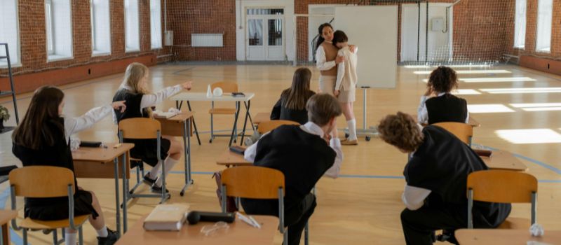 in the classroom, they are bullying their classmate