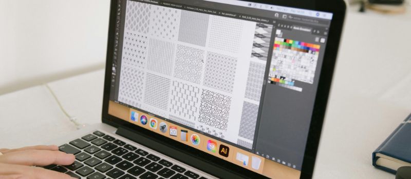 a photo of a laptop with a graphic arts