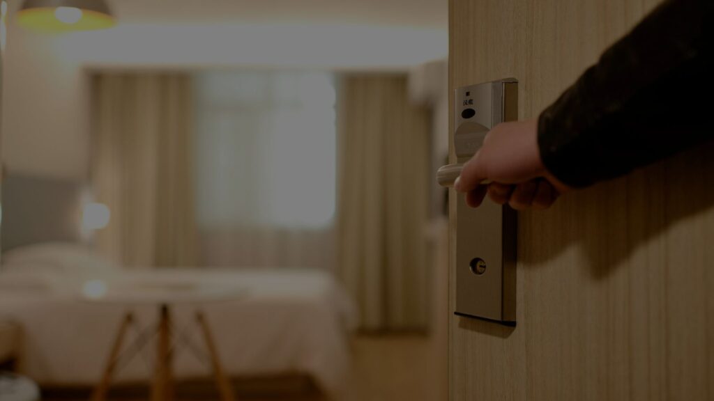 a photo of man opening the door