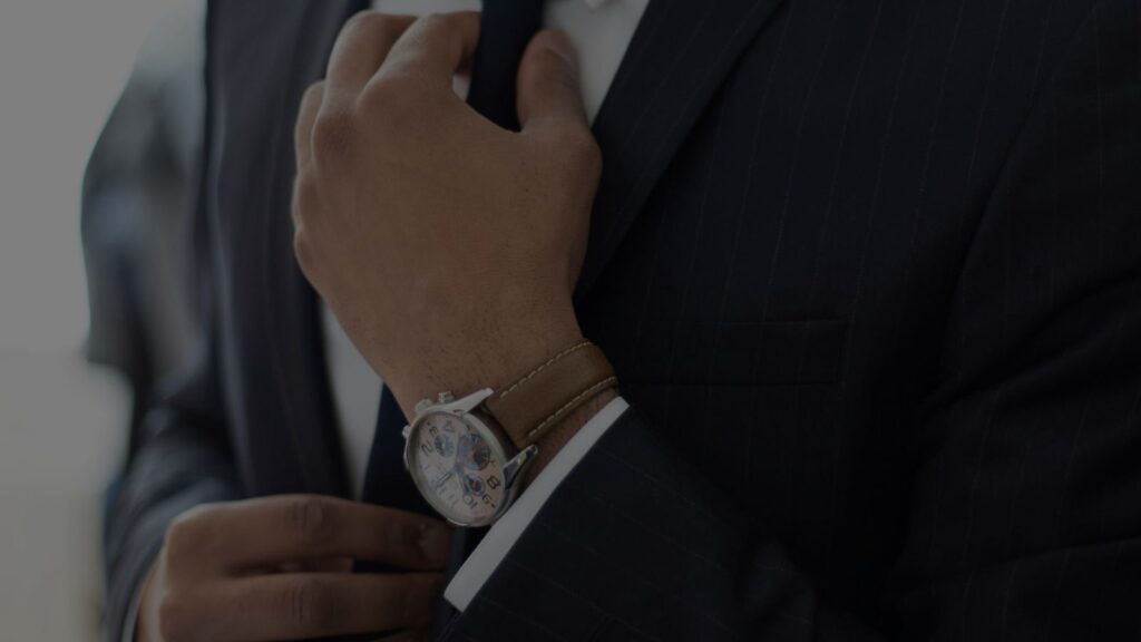 a lawyer fixing his necktie