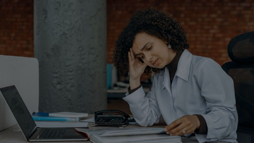 a photo of a woman analyzing the papers