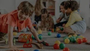 a child playing and smiling