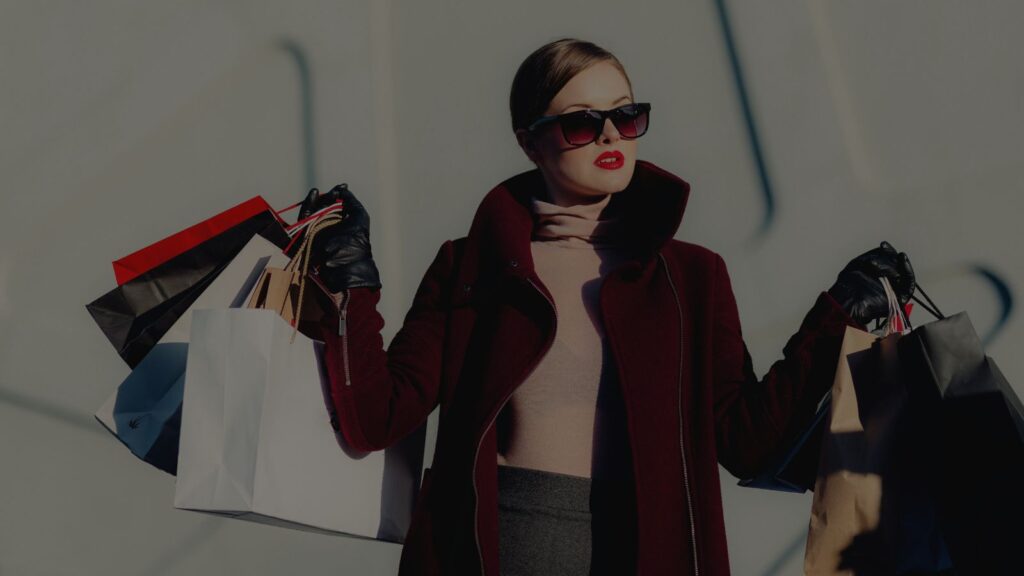 a woman holding her purchase