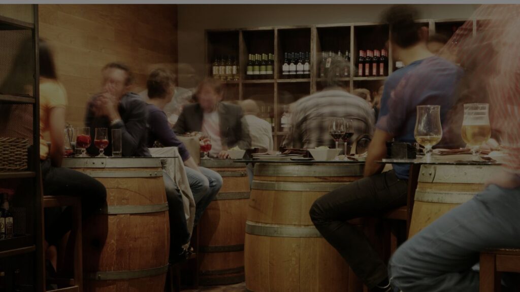 a photo of a bar and people drinking
