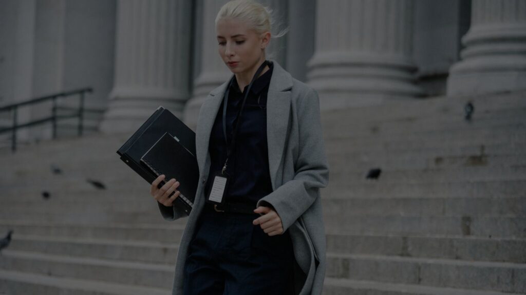 a woman going down from court
