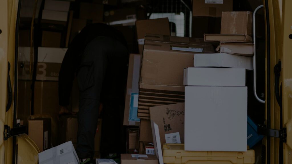 an image of a delivery man and all the packages