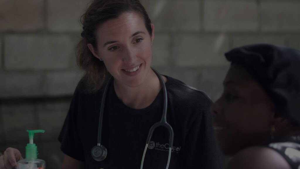 an image of a doctor talking with a patient