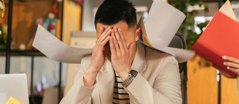 a photo of a person who has dealing a lot of pressure