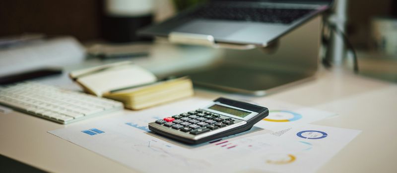 a photo of documents and calculator
