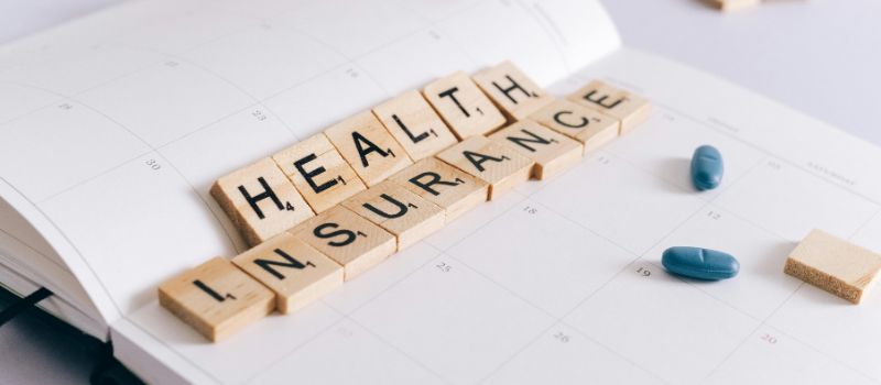 an image that has health insurance written on it