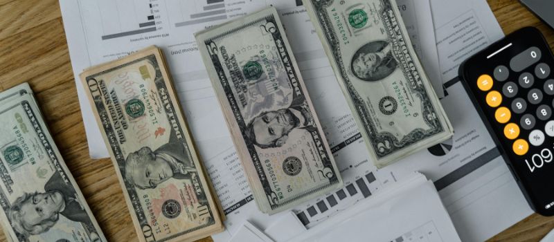 a photo of money and paperworks