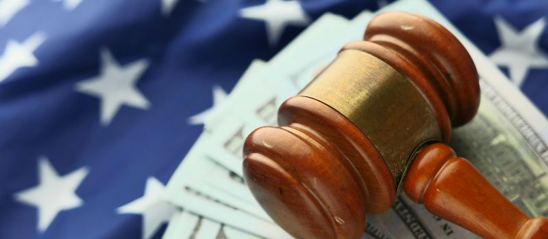 a photo of money under a gavel