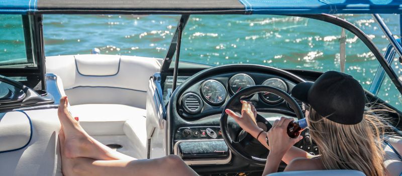 a moman onboard on the watercraft