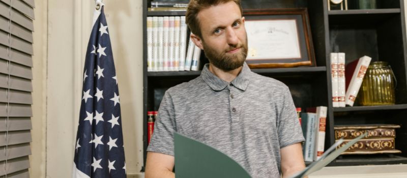 A man holding a document