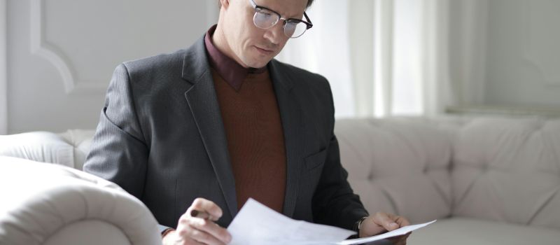 a man reviewing a contract
