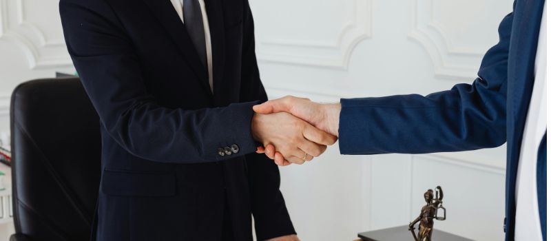client lawyer handshaking
