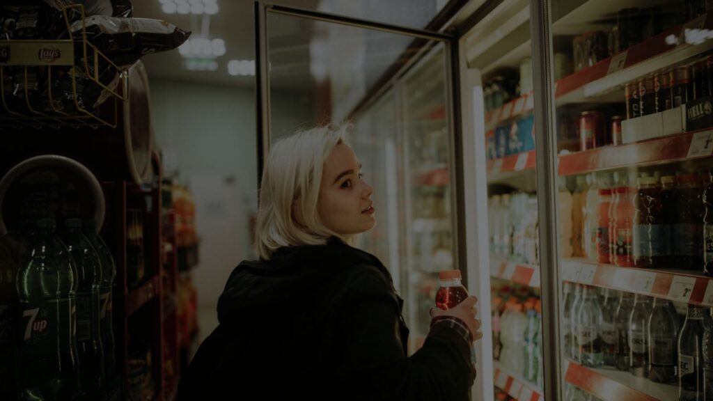 an image of woman inside a convenience store