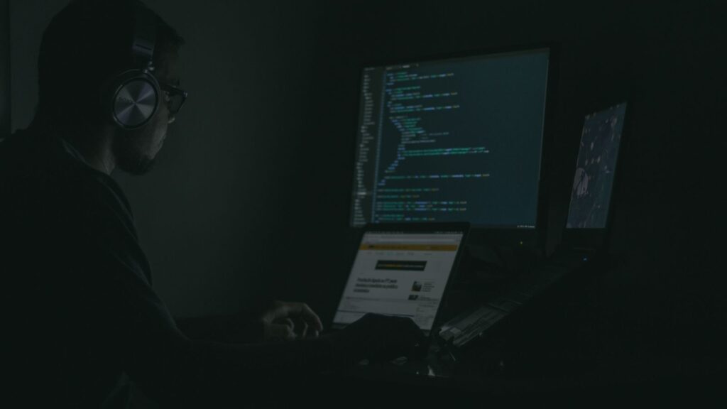 image of a person doing something in his computer set
