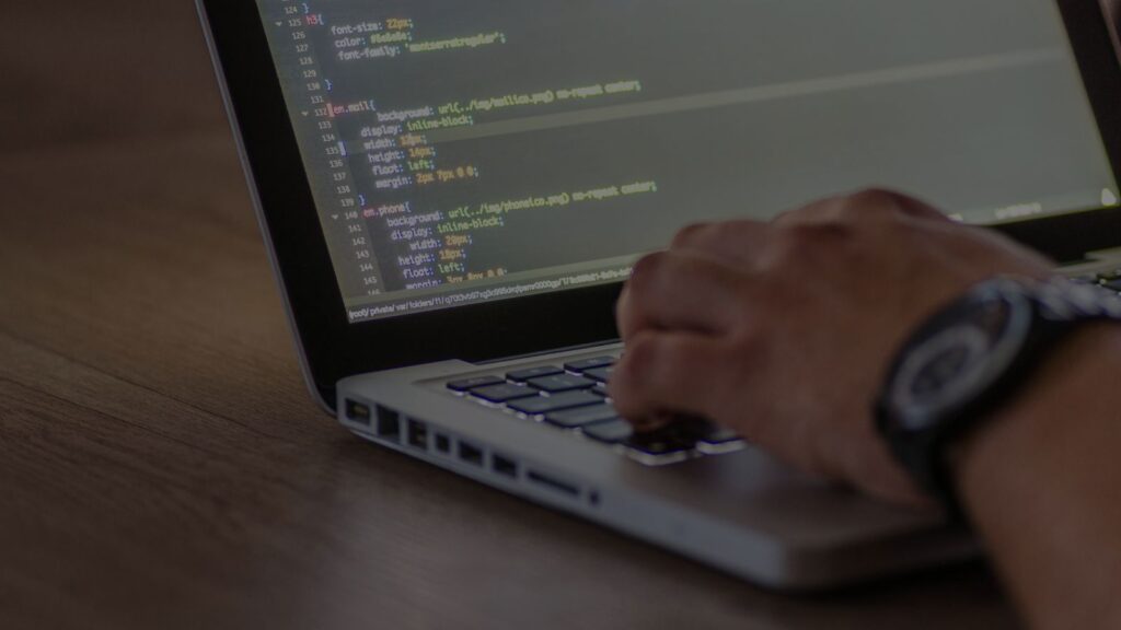 a person working in his laptop