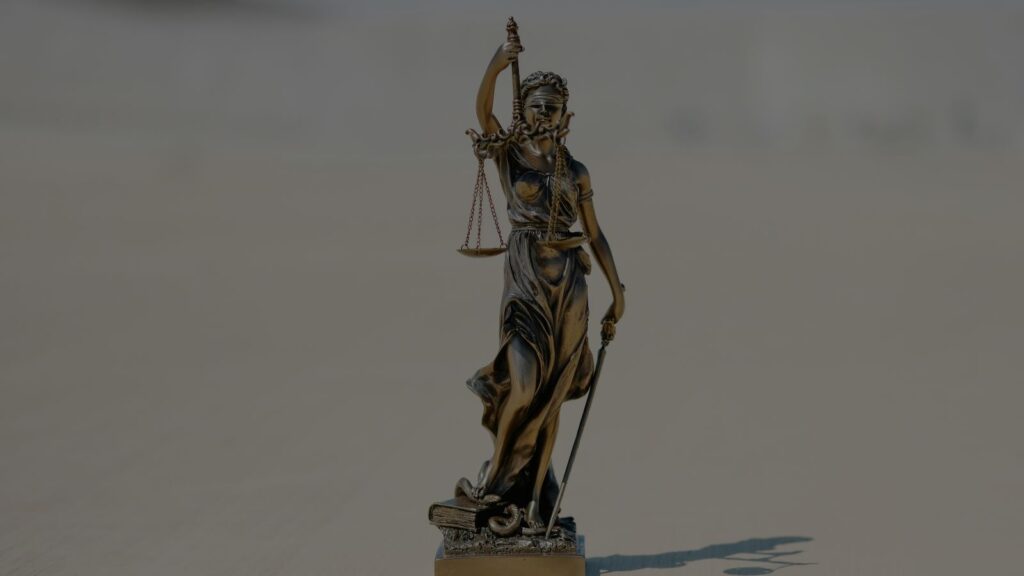 an image of lady justice or scales justice