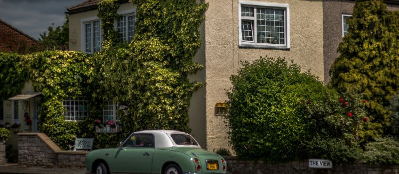 photo of house and car