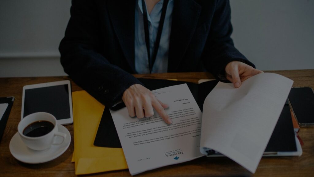 a person holding a piece of paper