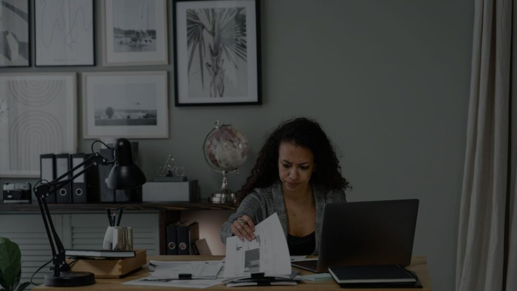 a woman reviewing her files