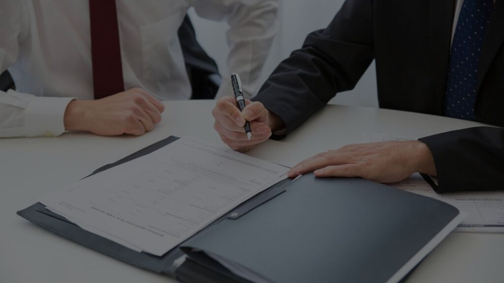 a person signing a contract