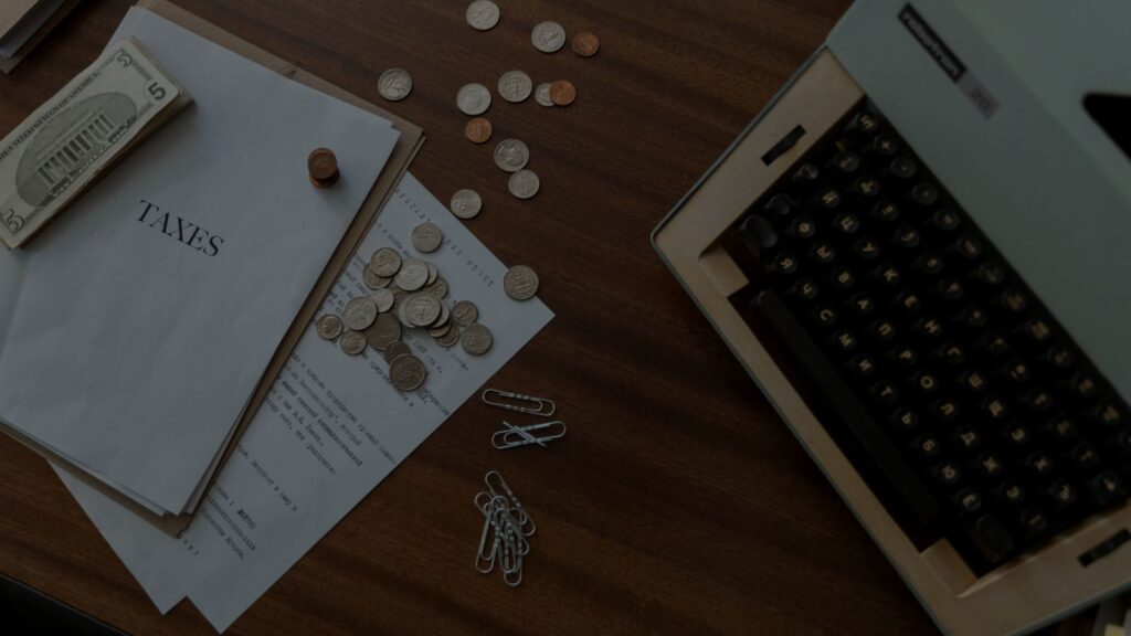 a documents and a coins above