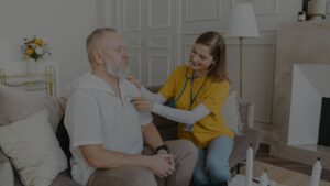 health aide assisting an elderly patient