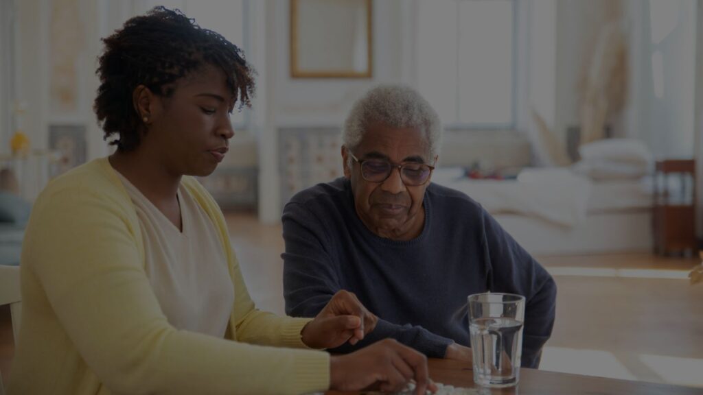 healthcare nurse counseling an elderly patient