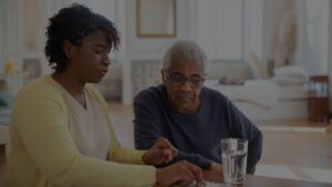 healthcare nurse counseling an elderly patient