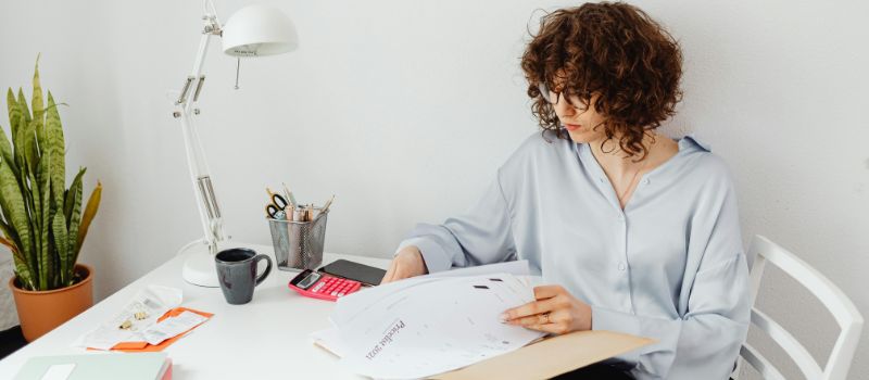 a person reviewing all the documents