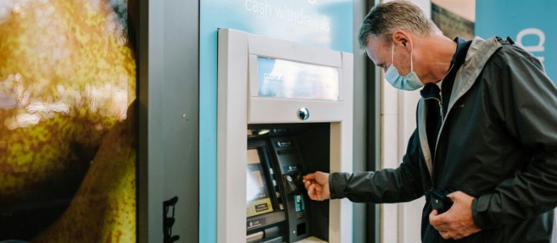 a person waiting his money to come out